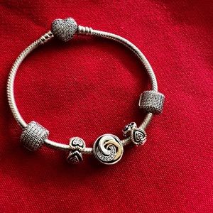 Pandora bracelet with 5 charms